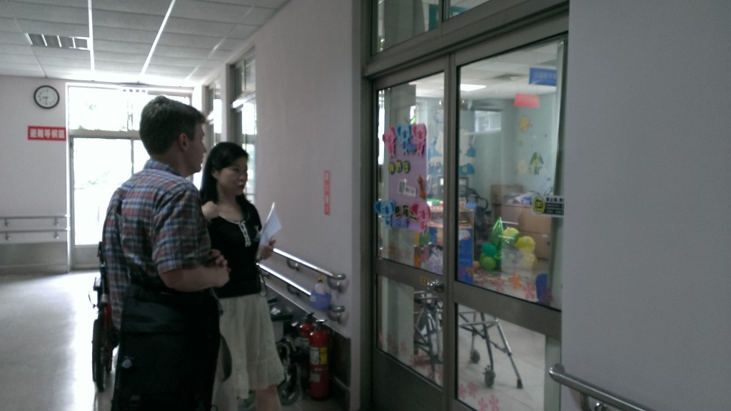Photo of John McCarthy at Love Home-Maria Social Welfare Foundation in Taichung, Taiwan with Iris Lee, SLP