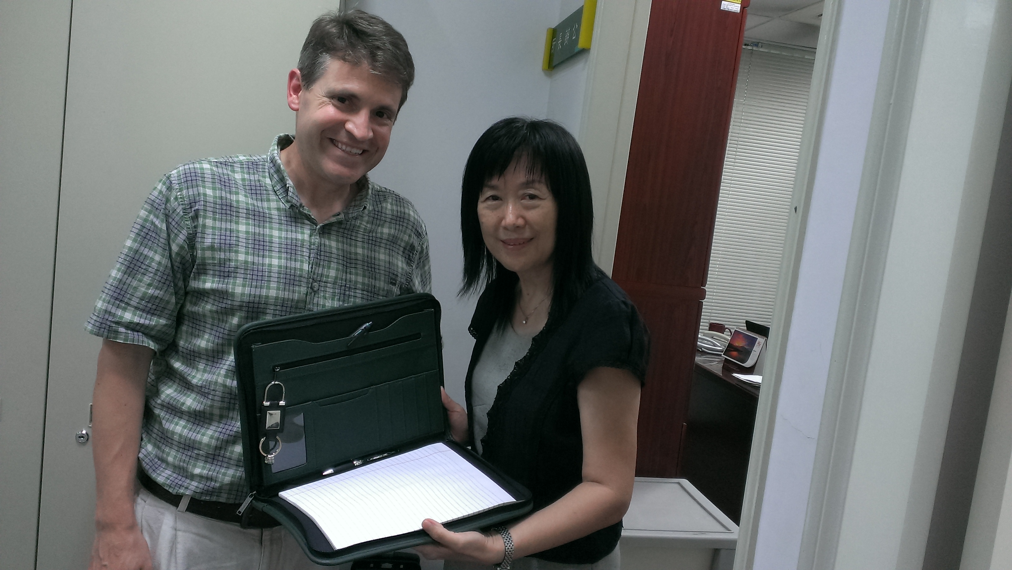 Photo of John McCarthy with Dr. Chen, Chair of speech and hearing disorders and sciences at NTUNHS